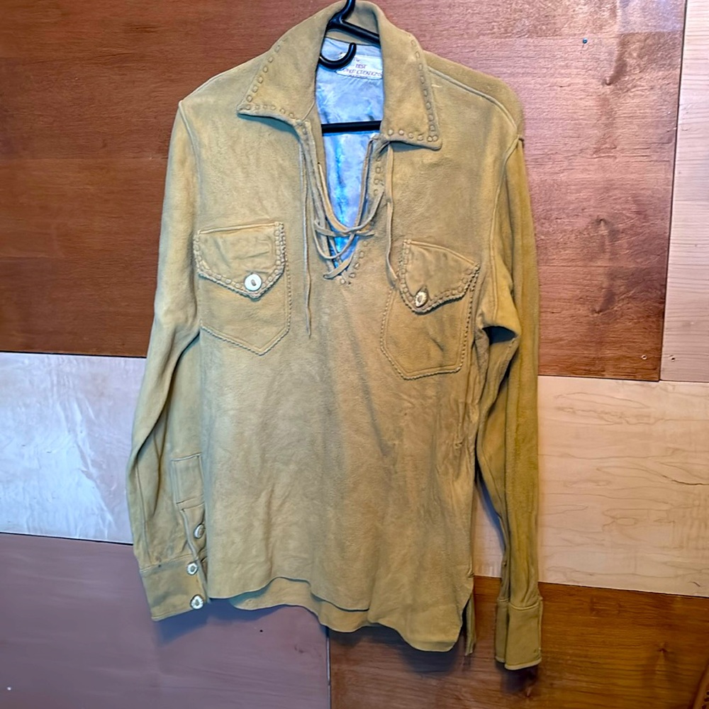 Leather Creations size M. Custom bone buttons  it’s a heavy beautiful piece.